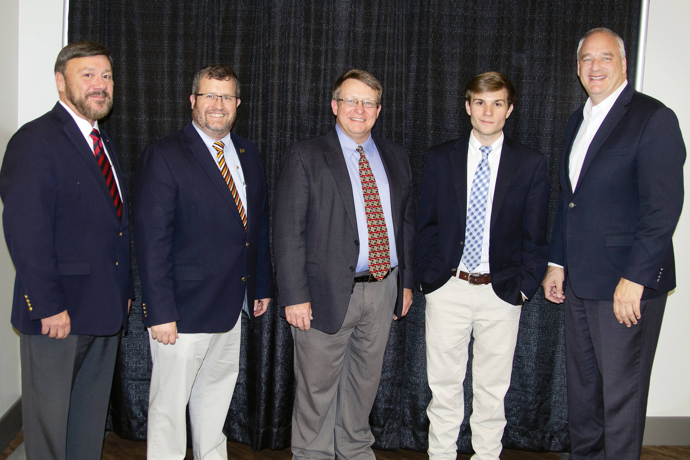 McNairy County resident and Tennessee Commissioner of Agriculture Jai Templeton (center) is pictured Dec. 5 following his induction into the UT Martin chapter of the Alpha Gamma Rho Fraternity. Also pictured (from left) are Marvin Flatt, fraternity adviser and director, Career Technical Education, Weakley County Schools; Dr. Todd Winters, fraternity adviser and dean, UT Martin College of Agriculture and Applied Sciences; Matthew Edmaiston, of Union City, Alpha Gamma Rho chapter president; and Dr. Charley Deal, executive director, WestStar Leadership Program. Templeton is a 1999 WestStar graduate.